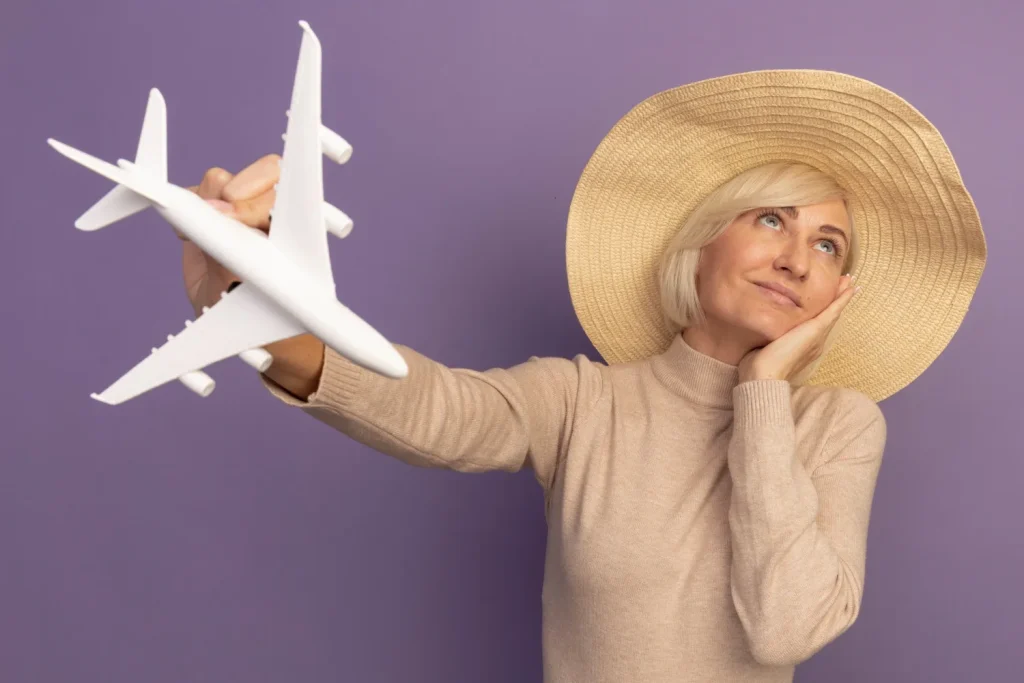 Lady holding a toy plane